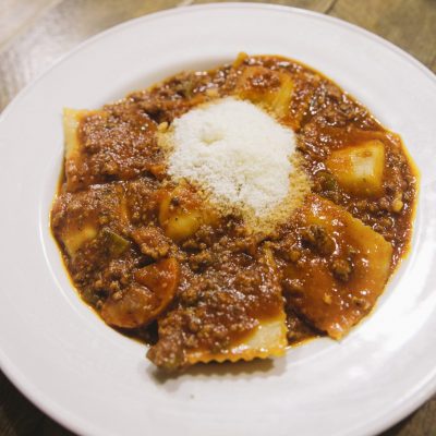 Tucco Real Food signature dishes Ravioli with Bolognese SauceGnocchi with Four Cheese SauceLasagnaEmpanadas